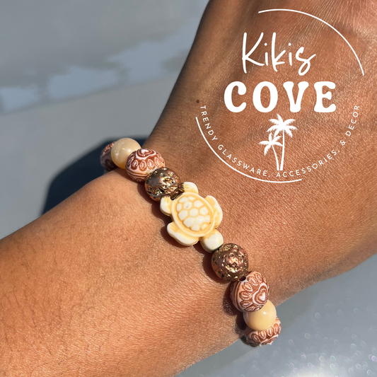 Sea Turtle Charm Bracelet with Gold Lava Rock, Resin Wood, and Mother of Pearl Beads